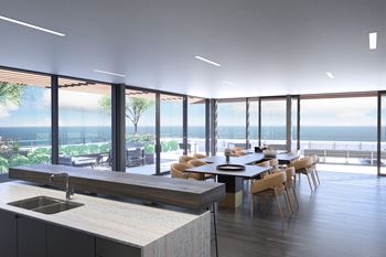 Resident lounge with commercial kitchen, bar and beverage center